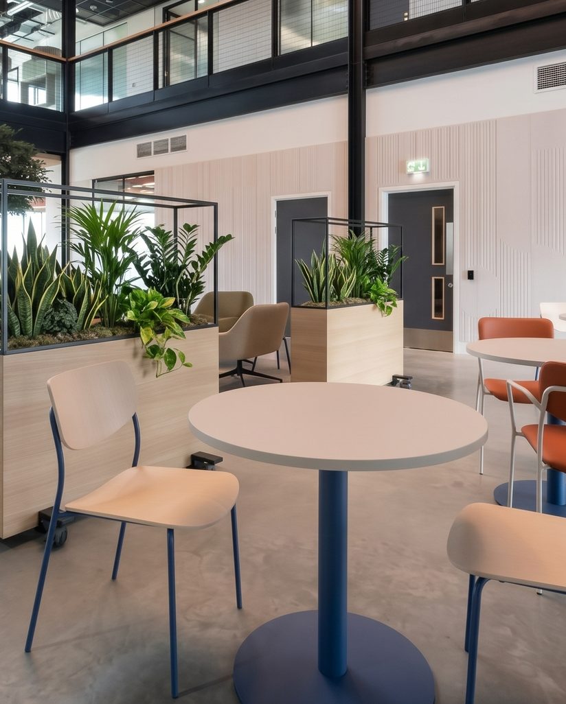 Tables and chairs in the ground-floor café